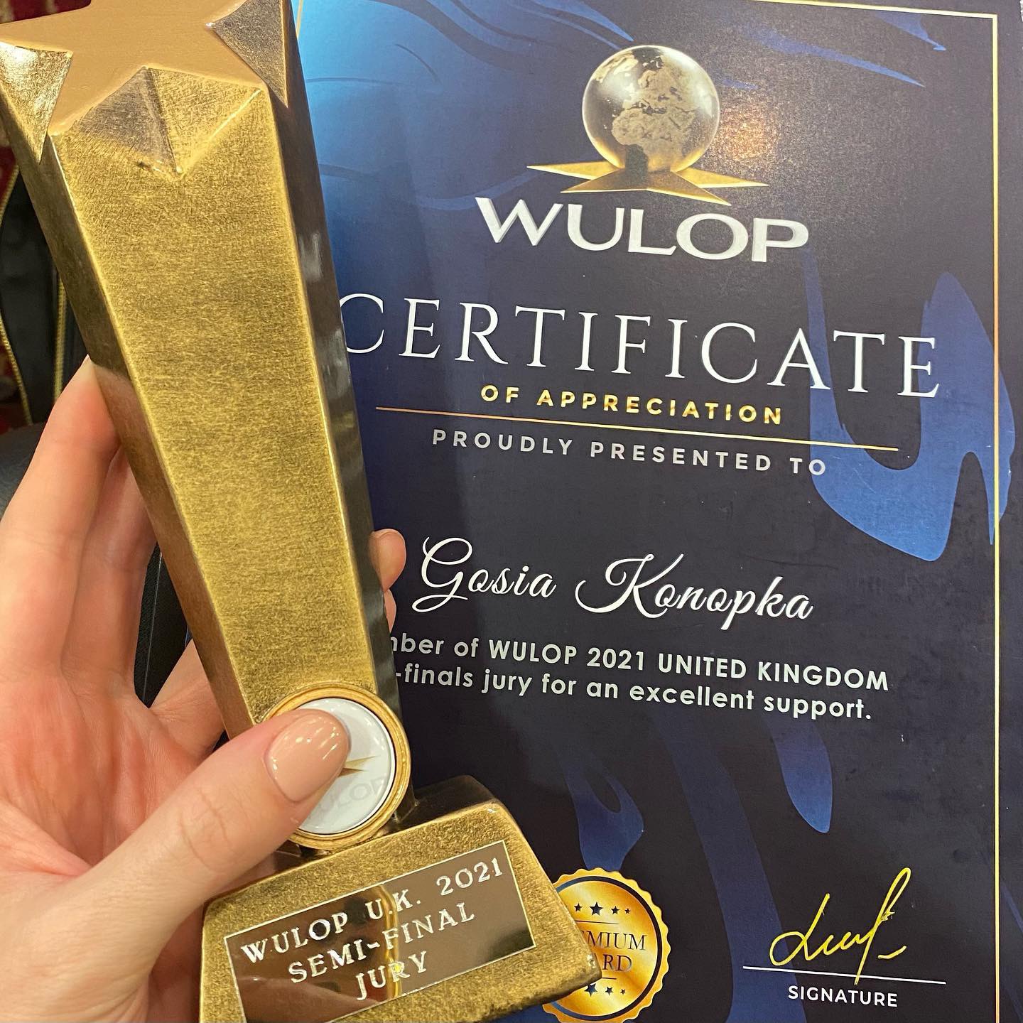 WULOP UK 2021 certificate and trophy presented to Gosia Konopka as a Permanent Makeup and PMU competition jury member at the WULOP UK Semi-Final
